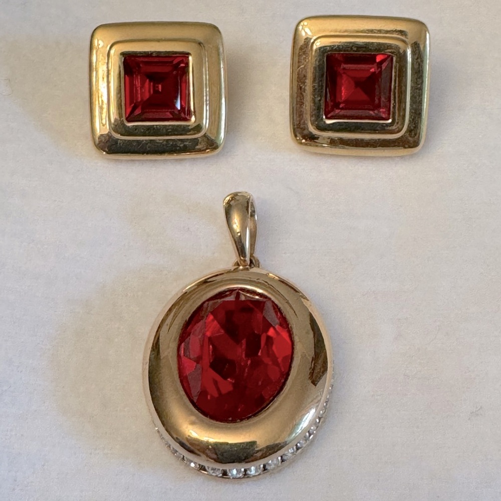 Pendant and matching red stone earrings.